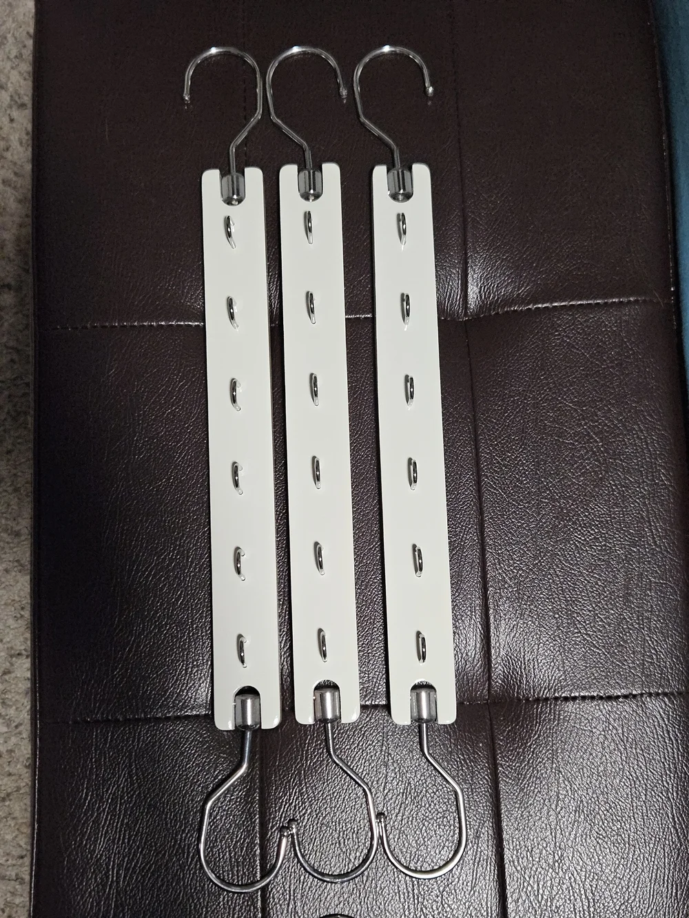 Space Saving Closet Organizers For Pants And Hangers in White and Wood
